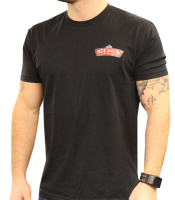 A man wearing a black t-shirt with a tattoo on the side.